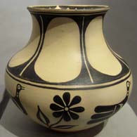 Roadrunner, floral and geometric design on a polychrome pot