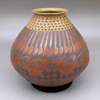 Polychrome jar with a flared opening, an indented design below rim, and a painted cuadrillos and geometric design