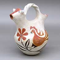 A polychrome cow's head cream pitcher