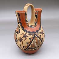 A polychrome wedding vase decorated with a corn plant, cloud and geometric design