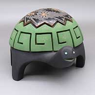 A polychrome turtle figure