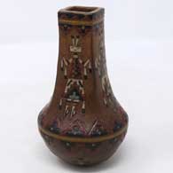 Polychrome jar with square opening plus sgraffito-and-painted Yei-bichai figures and geometric design