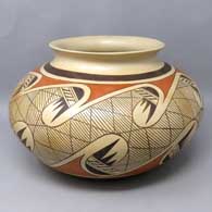 Polychrome jar with a migration pattern design