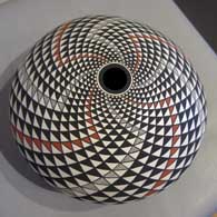 Geometric design on a polychrome seedpot