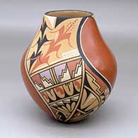 A polychrome jar decorated with a corn stalk and geometric design