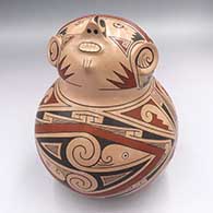 Ramos Polychrome effigy pot with a 2-panel geometric design