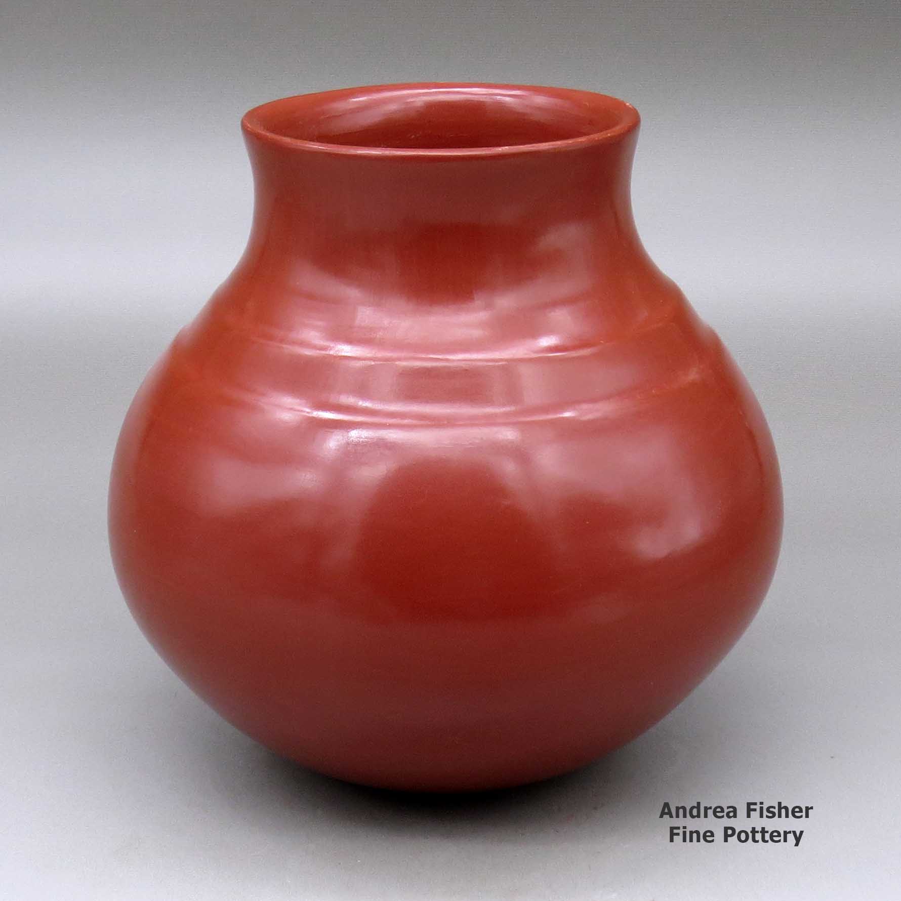 Click or tap to see a larger view A plain red double-shouldered water jar made by Virginia Garcia of Santa Clara