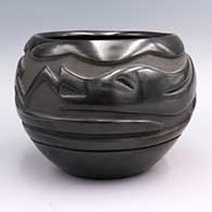 Black jar carved with avanyu and kiva step design
 by Mary Singer of Santa Clara