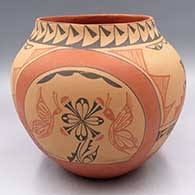 Polychrome jar with a 4-panel butterfly, flower and geometric design
 by Mary Madelena of Jemez