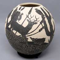 Black and white jar with sgraffito desert wildlife and nature design
 by Angel Guerrero of Mata Ortiz and Casas Grandes