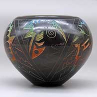 A polychrome bowl decorated with a sgraffito and painted Dawa, kokopelli, Hopi dancers and geometric design, click or tap to see a larger version