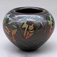 A polychrome bowl decorated with a sgraffito and painted Dawa, kokopelli, Hopi dancers and geometric design
 by Ergil Vallo of Acoma