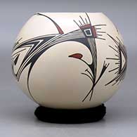 A polychrome jar decorated with a two panel stylized bird and geometric design, click or tap to see a larger version