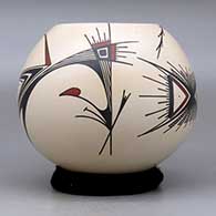 A polychrome jar decorated with a two panel stylized bird and geometric design, click or tap to see a larger version