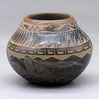 A small black jar with a sienna rim and decorated around the body with a sgraffito wildlife, nature, avanyu, feather and geometric design
 by Kevin Naranjo of Santa Clara
