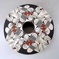 Click for a larger view A polychrome seed pot decorated with a four-panel geometric design
by Susy Martinez of Mata Ortiz and Casas Grandes