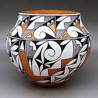 A polychrome jar decorated with a four-panel geometric design
 by Doris Patricio of Acoma