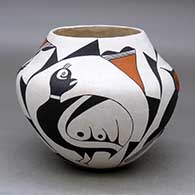 A polychrome jar decorated with a four panel bird and geometric design
 by Edna Chino of Acoma