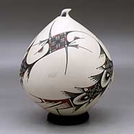 A polychrome seed pot with a sculpted opening and decorated in the Quezada style with a flowing geometric design, click or tap to see a larger version