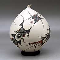 A polychrome seed pot with a sculpted opening and decorated in the Quezada style with a flowing geometric design, click or tap to see a larger version