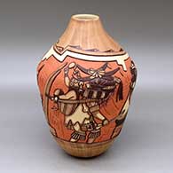 Click for a larger view A polychrome jar decorated with a carved, sgraffito and painted Nataska and Mudhead clan dancers and geometric design
 by Elvira Nampeyo of Hopi