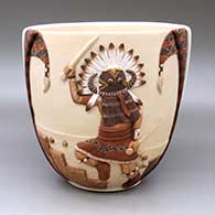 A deep polychrome bowl decorated with a carved, sgraffito and painted kachina dancer, sacred textile, bird element and geometric design
 by Harrison Jim of Hopi