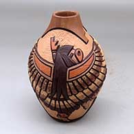 Click for a larger view A polychrome jar decorated with a carved, sgraffito and painted eagle dancer, other dancers and geometric design
 by Carla Nampeyo of Hopi