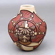 Click for a larger view A carved and painted polychrome jar depicting the Water Maiden and a male dancer with a geometric design
 by Elvira Nampeyo of Hopi