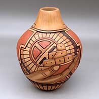 Click for a larger view A polychrome jar decorated with a two panel carved, sgraffito and painted hand, pueblo, sun kachina and geometric design
 by Thomas Polacca of Hopi