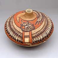 A large polychrome seed pot carved and painted with an Eagle Dancer and Eagle Boy and geometric design
 by Elvira Nampeyo of Hopi