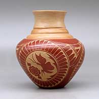 A red on tan triple shouldered jar with a flared rim decorated with a three panel sgraffito butterfly, flower, feather and geometric design, click or tap to see a larger version