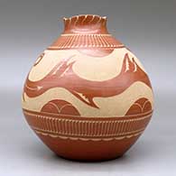 A red jar with a notched, organic rim and decorated around the body with a sgraffito avanyu, feather, cloud, kiva step and geometric design, click or tap to see a larger version
