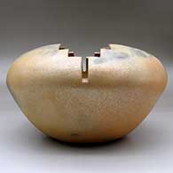 A large golden micaceous prayer jar with fire clouds and a geometric carved opening, click or tap to see a larger version