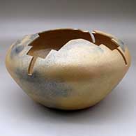 A large golden micaceous prayer jar with fire clouds and a geometric carved opening
 by Angie Yazzie of Taos