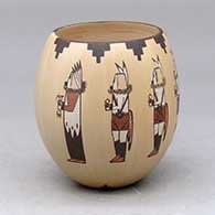 A polychrome jar decorated with a Day Chant Dancer and geometric design
 by Ida Sahmie of Dineh