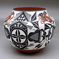 A polychrome jar decorated with a three panel parrot, fineline, checkerboard and geometric design
 by Franklin Peters of Acoma
