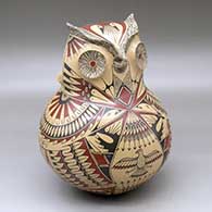 A Ramos polychrome owl pot decorated with a bird, arrow, feather and geometric design
 by Adrian Rojas of Mata Ortiz and Casas Grandes