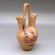 A polychrome wedding vase decorated with a two-panel bird element and geometric design
 by Gloria Kahe of Hopi