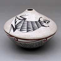 A polychrome jar with a small opening and decorated with a fineline, lizard, corn stalk and geometric design
 by Sylvia Naha of Hopi