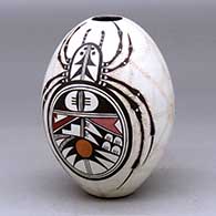 A polychrome seed pot decorated with a two panel spider, spiderweb and geometric design
 by Burel Naha of Hopi