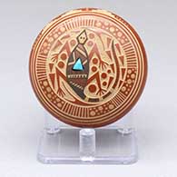 A miniature polychrome seed pot with a sgraffito and painted lizard and geometric design plus an inlaid stone
 by Glendora Fragua of Jemez