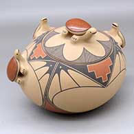 A lidded polychrome turtle bowl
 by Laura Gachupin of Jemez