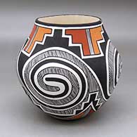 A polychrome jar decorated with a four panel Tularosa spiral, fineline, kiva step and geometric design
 by Myron Sarracino of Laguna