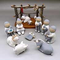 A fourteen piece Isleta nativity with a shed
 by Stella Teller of Isleta