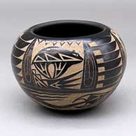 A black and buff jar decorated with a bear, feather, avanyu and geometric design
 by Red Starr of NonPueblo