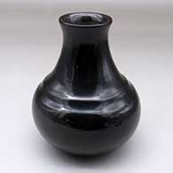 A plain polished black double shouldered water jar
 by Virginia Garcia of Santa Clara