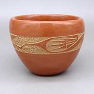 Red bowl with a sgraffito avanyu design
 by Jennifer Tse Pe of San Ildefonso