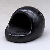 A small black horno
 by Carmelita Dunlap of San Ildefonso