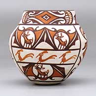 A small polychrome jar decorated with a four-panel deer-in-his-house, rainbird and geometric design,., click or tap to see a larger version