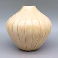 Tan melon jar with 24 carved ribs, click or tap to see a larger version